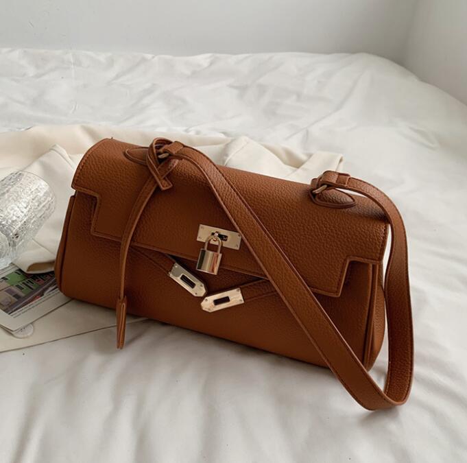 

Wholesale factory womens shoulder bag simple solid color leathers handbag popular in Europe and America women handbags elegant atmosphere leather backpack