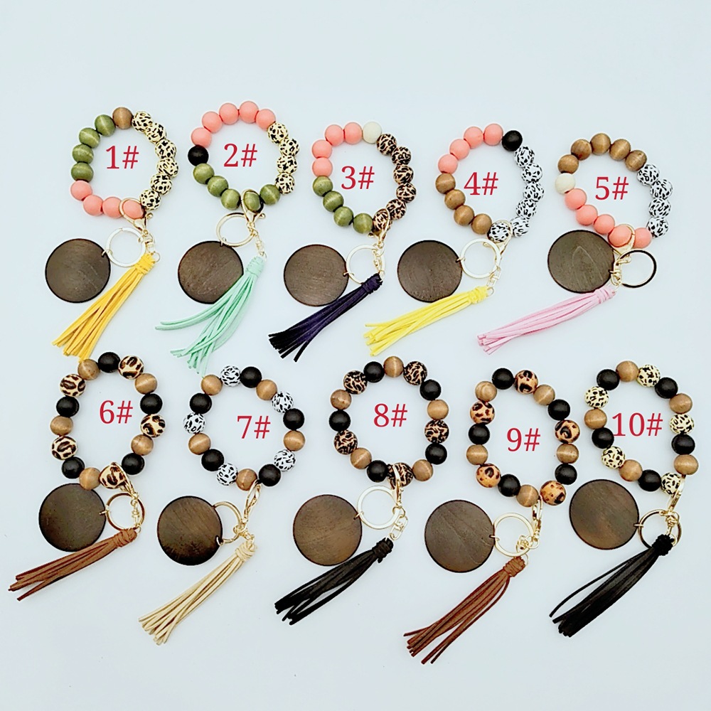 

Leopard Wooden Bead bracelet keychain with Tassel Wristband Bangle Key chain