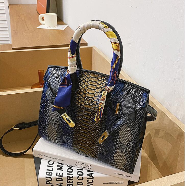 

womens leathers clutch bag elegant fashion Serpentine handbag street trend contrast color leather shoulder bags personalized scarf decoration women backpack