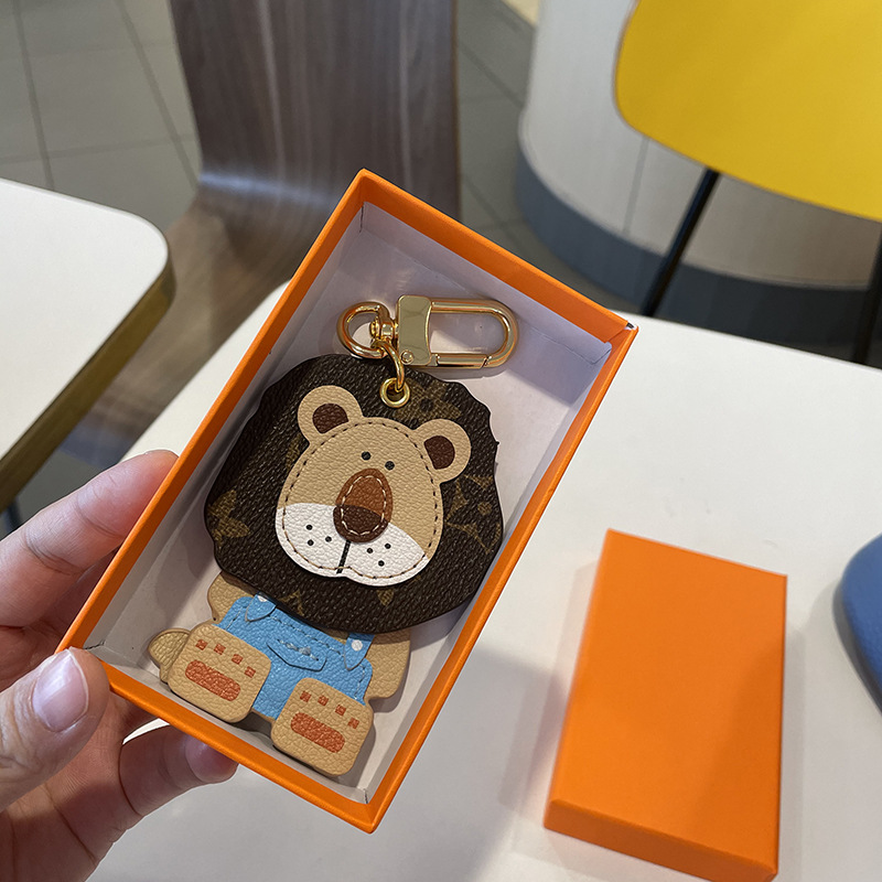 

2021 Fashion Key chain wallet pendant lion fighting doll pendant key chain leather keychain top quality
