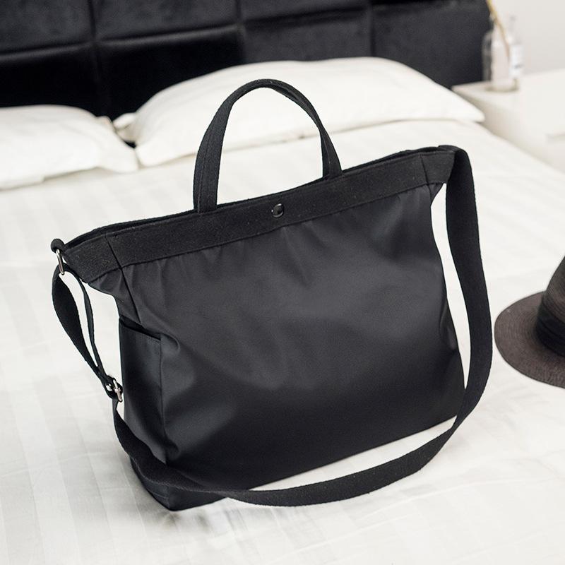 

Duffel Bags Solid Color Large Capacity Women Handbag Light Portable Travel Bag For Female Nylon Travelling Duffle Packing Weekend, Black
