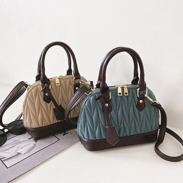 

Factory outlet women bag striped fashion handbag Western style fold portable shell handbags retro leather shaped womens shoulder bags