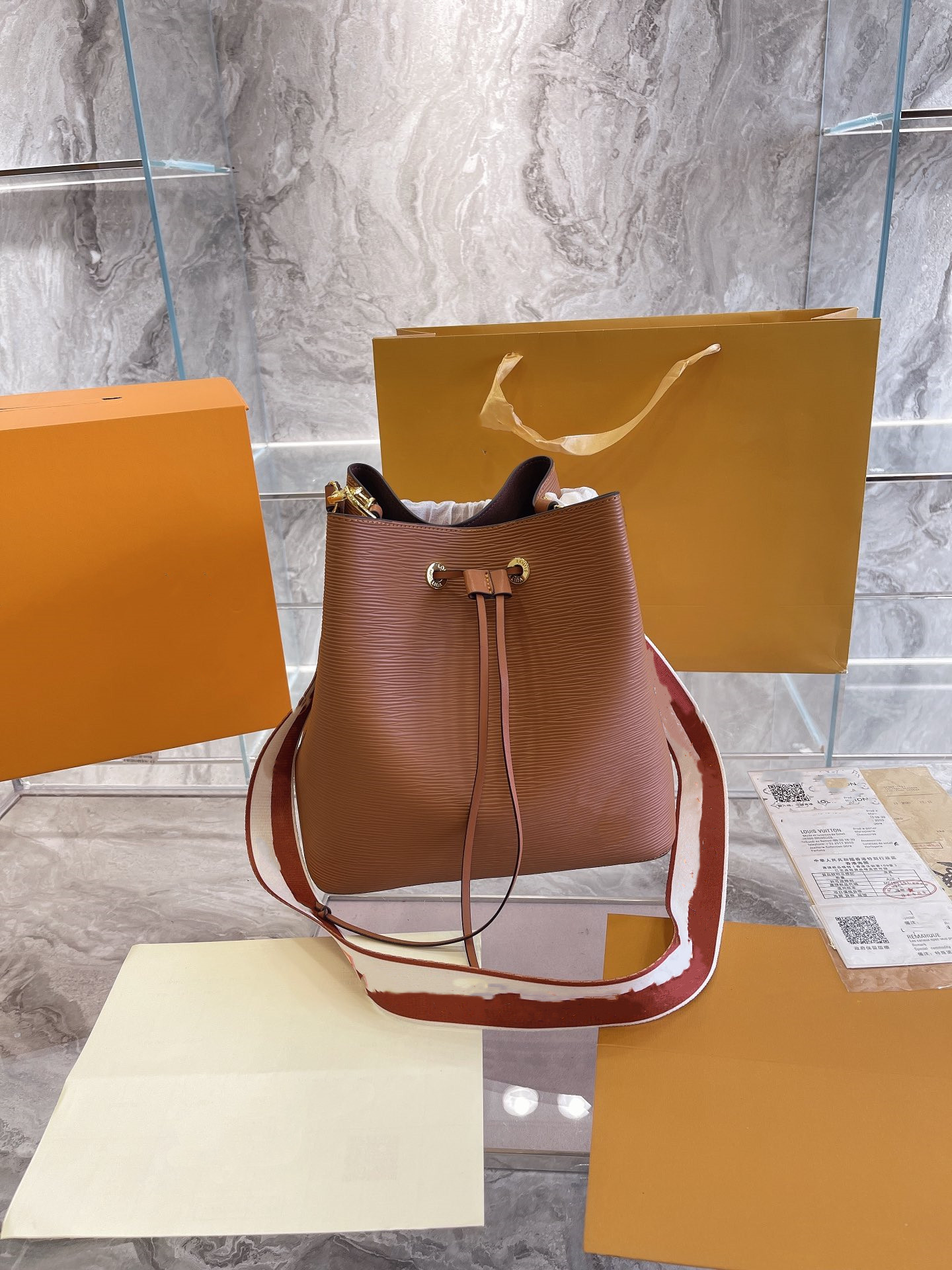 

Water ripple pattern leather Bucket Bag Black Whitw Brown Large capacity drawstring Handbag Luxury Design women's bags high-quality Handbags