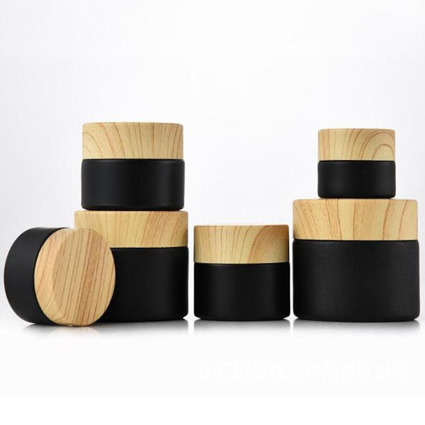 

Black frosted glass jars cosmetic jars with woodgrain plastic lids PP liner 5g 10g 15g 20g 30 50g lip balm cream containers