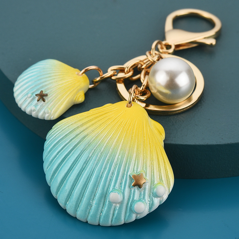 

Shell Key Rings Fob Bag Charms Gold Ocean Animal Starfish Keychain Chains Holder for Car Keys Fashion Alloy Crafts Gifts Pendant Imitation Pearl Keyring Accessories