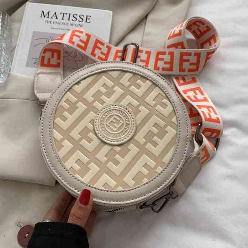 

Design Women's new hand small round fashion simple wide sling shoulder diagonal bag Handbags, Black