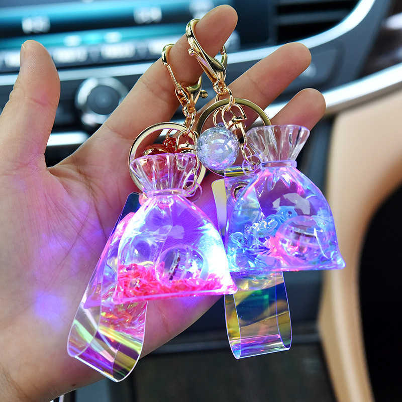 

New Acrylic Glow Lucky Bag Liquid Keychain Creative Quicksand Bottle Key Chain Women Bag Pendant Car Keyring Trinket Lovely Gift G1019