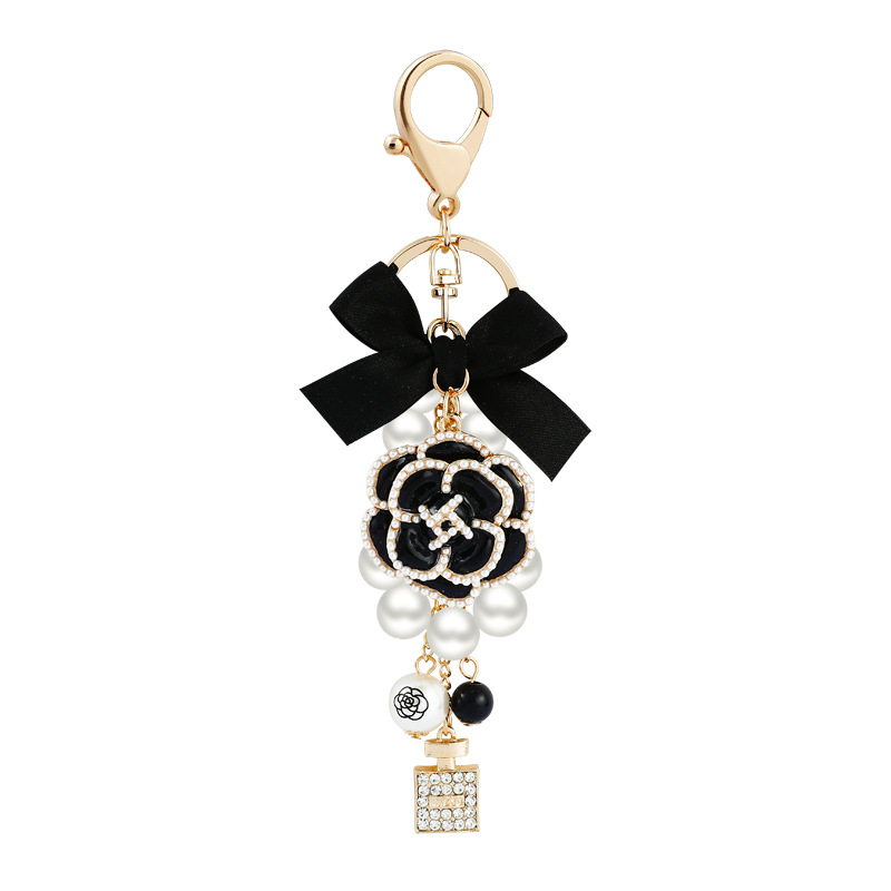 

Keychains Bow Pearl Flower Keychain Women Bag Purse Charms Crystal Rhinestone Key Chain Ring Fashion Holder Car Keyrings Trinket