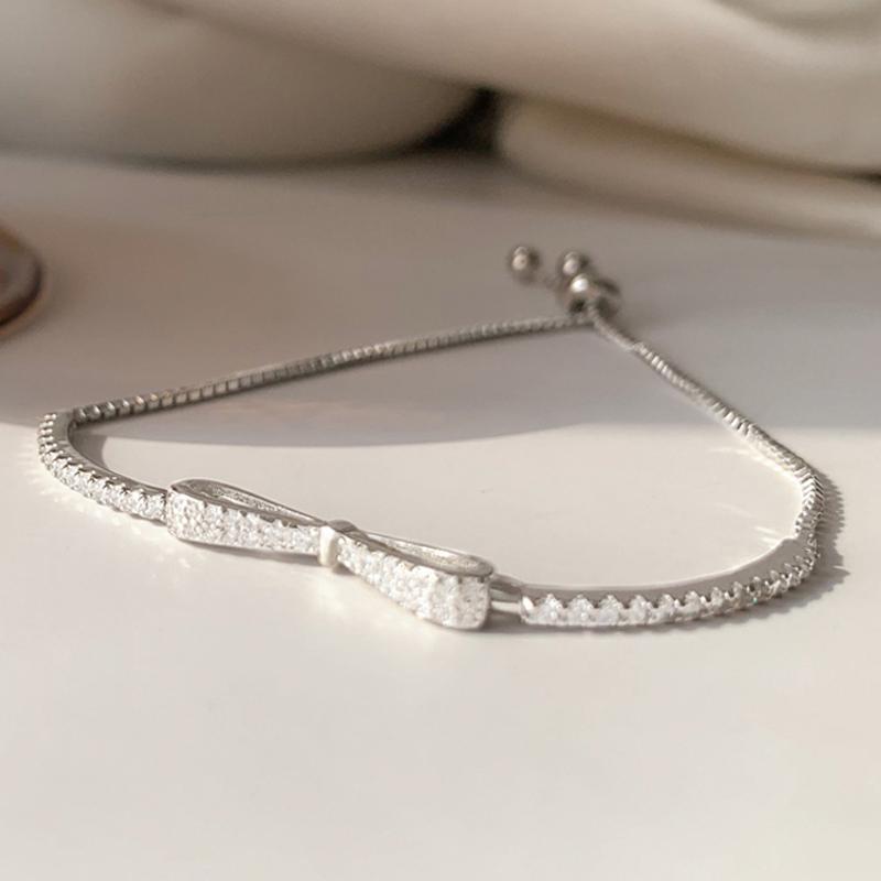 

Charm Bracelets Fashion CZ Shiny Bowknot Bracelet For Women Crystal Zircon Jewelry Adjustable Silver Plated Chain Gift