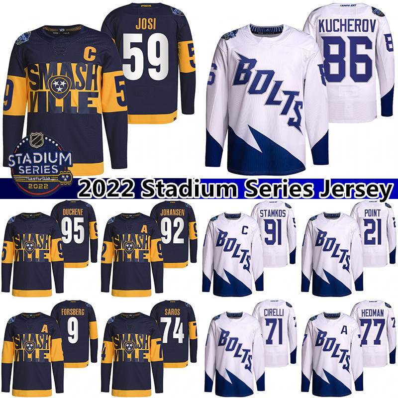 

2022 Stadium Series Tampa Bay Lightning Nashville Predators Jersey 59 Roman Josi 74 Juuse Saros 86 Nikita Kucherov 10 Corey Perry 21 Brayden Point hockey jerseys, White