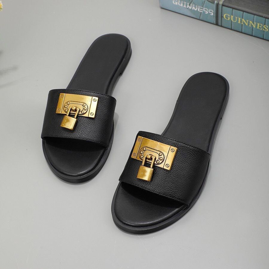 

Summer fashion woman beach slippers Leather Cartoon Big Head Slippers Flat shoes Hotel Letters woman Shoes Metal Lock head slippers -41