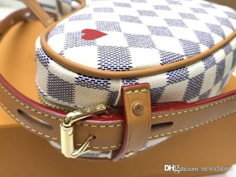 

Game On Coeur Heart Bag Brand New Cruise 2021 Limited Edition shoulder bag Size:22*20*6CM