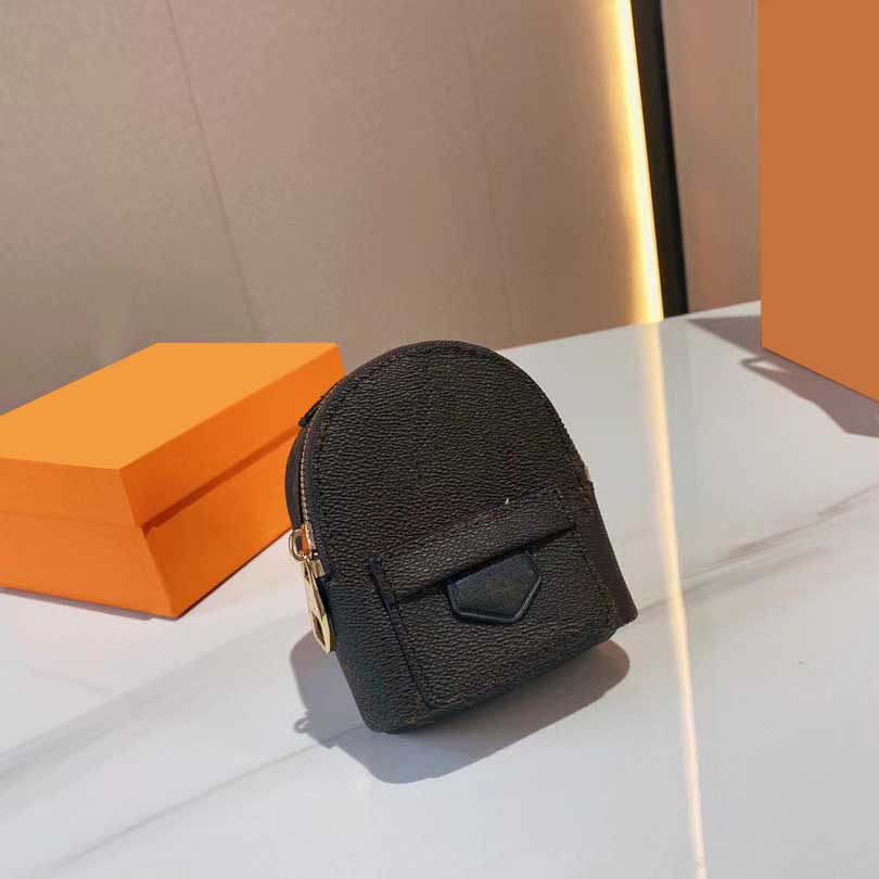 

Brown Lady Mini Wrist Bag Purse Causal Fashion Backpack Designer Bags High Quality Leather Letter Women Zipper Coin Purses Watch Organizer Wallets, Brown 2