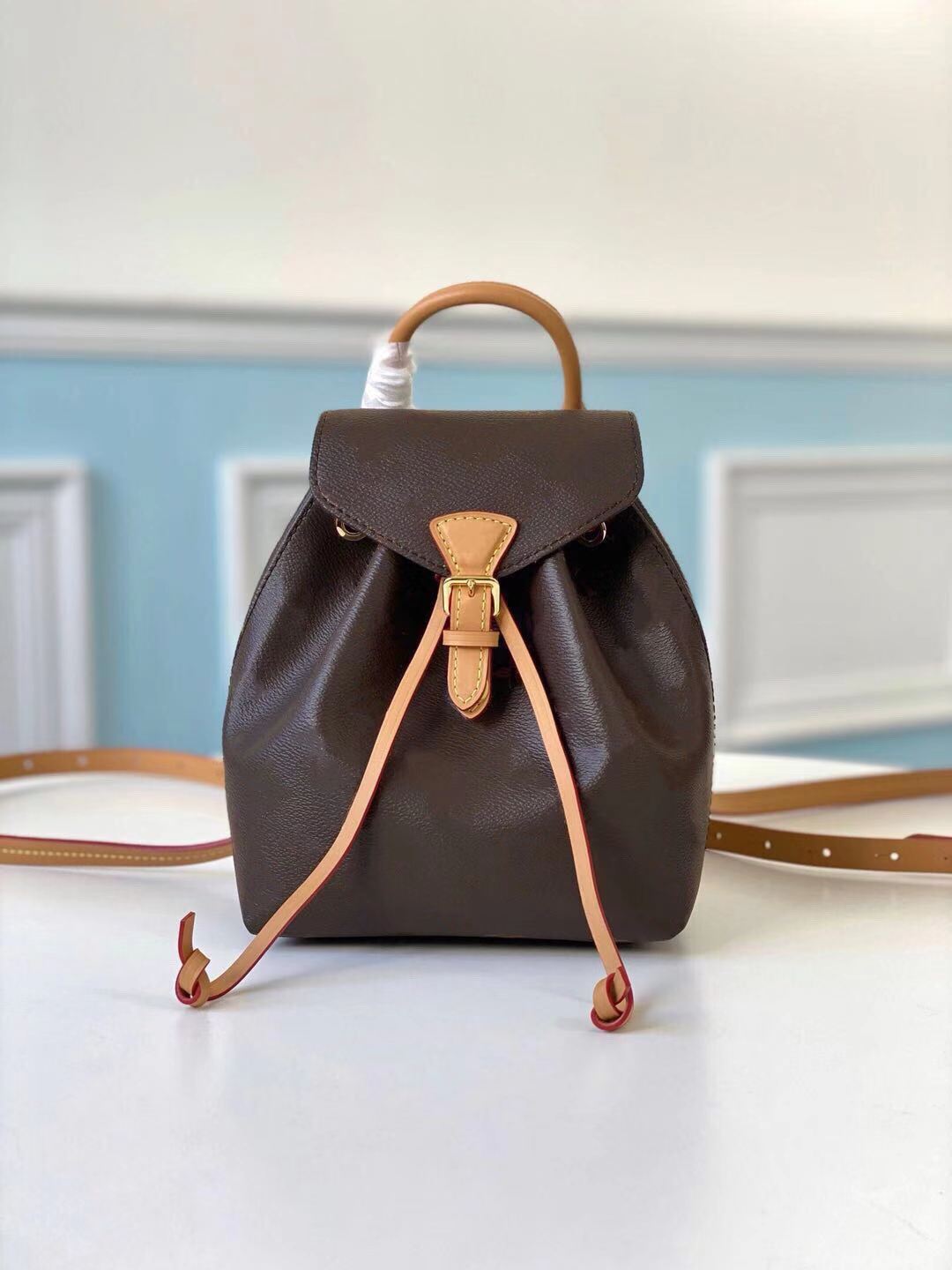 

Fashion Backpack lady Coated canvas cowhide magnetic buckle open and close leather drawstring zipper outer pocket removable pendant Shoulder, Black strap