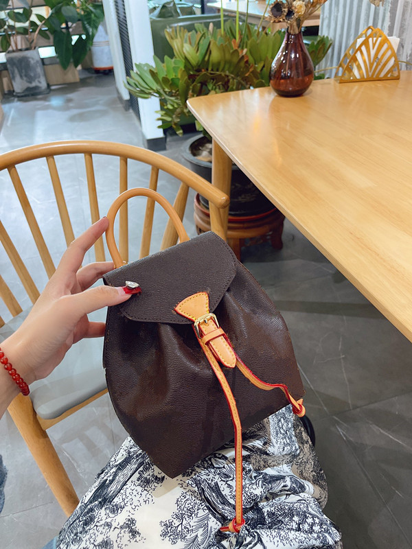 

Wholesale Brand Designer Palm Springs Backpack Mini genuine leather backpack Women Cosmetic bags leather Shoulder Bag Travel Bag Wallet NB567, Brown