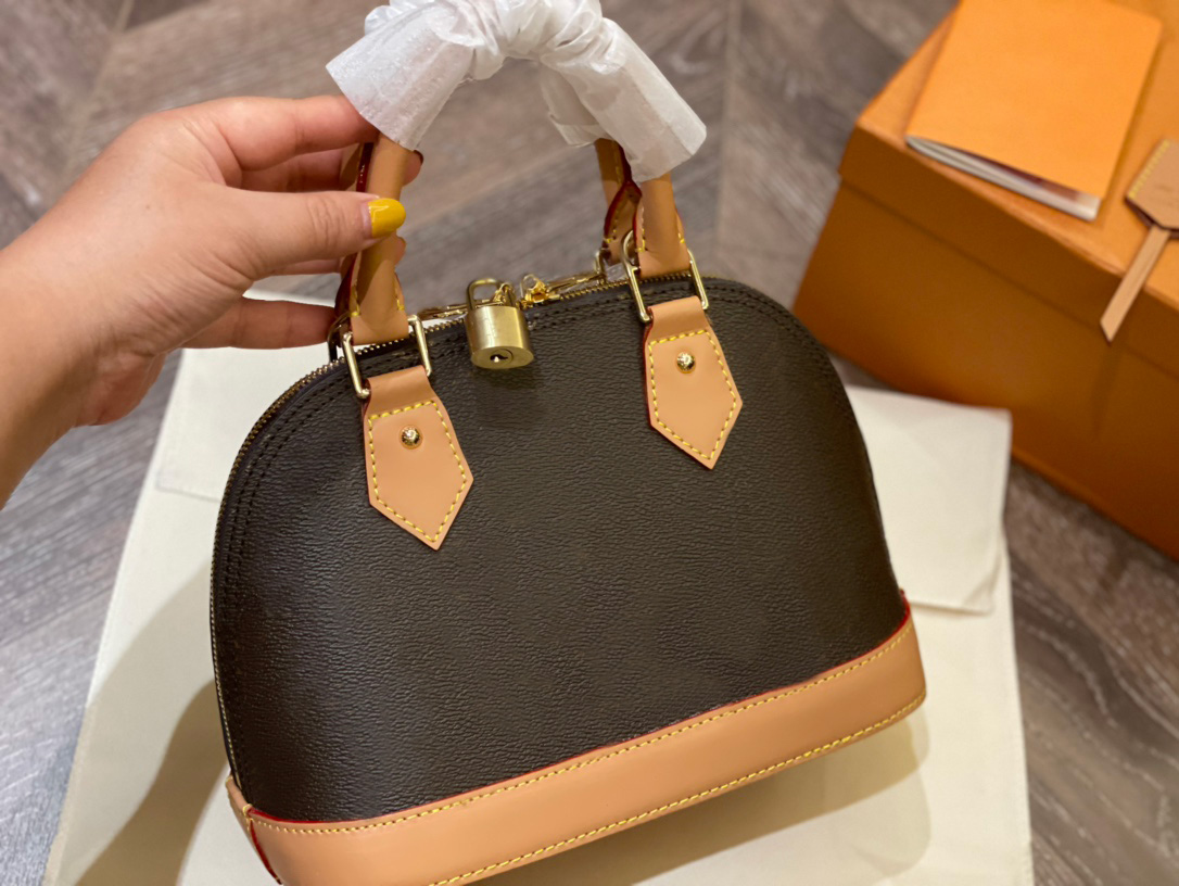 Sacs de créateurs Femmes 2021 Sacs à main classiques de haute qualité Bandoulière Alma Shell Sac Mode Original Sac à main unique Taille 25 * 18cm