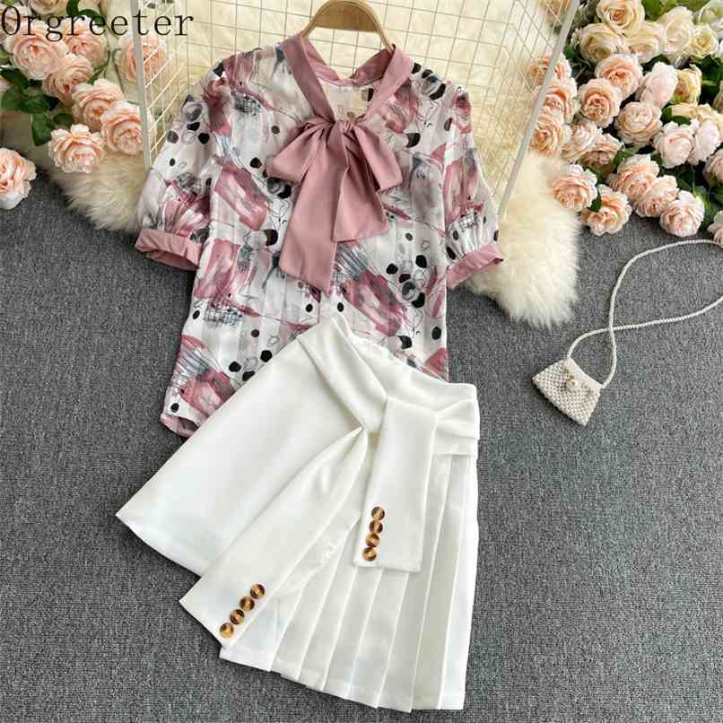 

Summer Bow tie Fluttering Ink Print Shirt With Stitching Buttons Pleated Mini Skirt Two piece set Women 210602, Pink