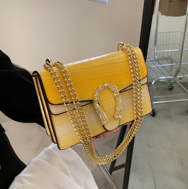 

Factory wholesale women chain bag simple atmospheric pressure flower leather handbag street Stone grain shoulder bags Candy-colored leathers fashion handbags