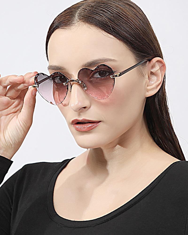 

Sunglasses 2021Fashion Rimless Women's Design Fashion Lady Sun Glasses Vintage Alloy Classic Designer Shades UV400 Eyewear1