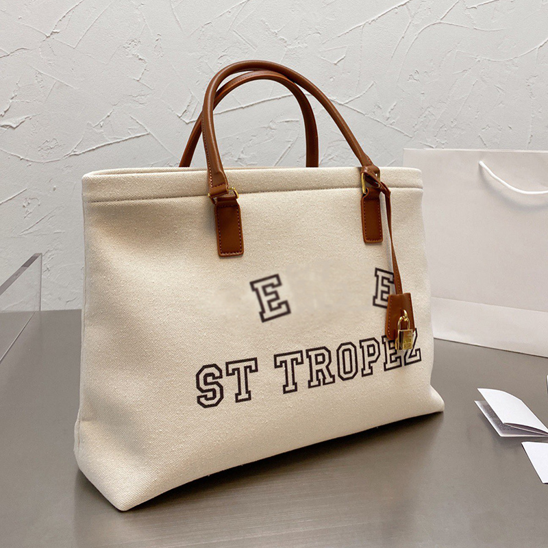 

Designer Women Cabas Canvas Tote Bag Paris Brand Letter Printed Totes Handbags Woman Shopping Shoulder Handbag Luxurys Designers Bags With Lock High Quality