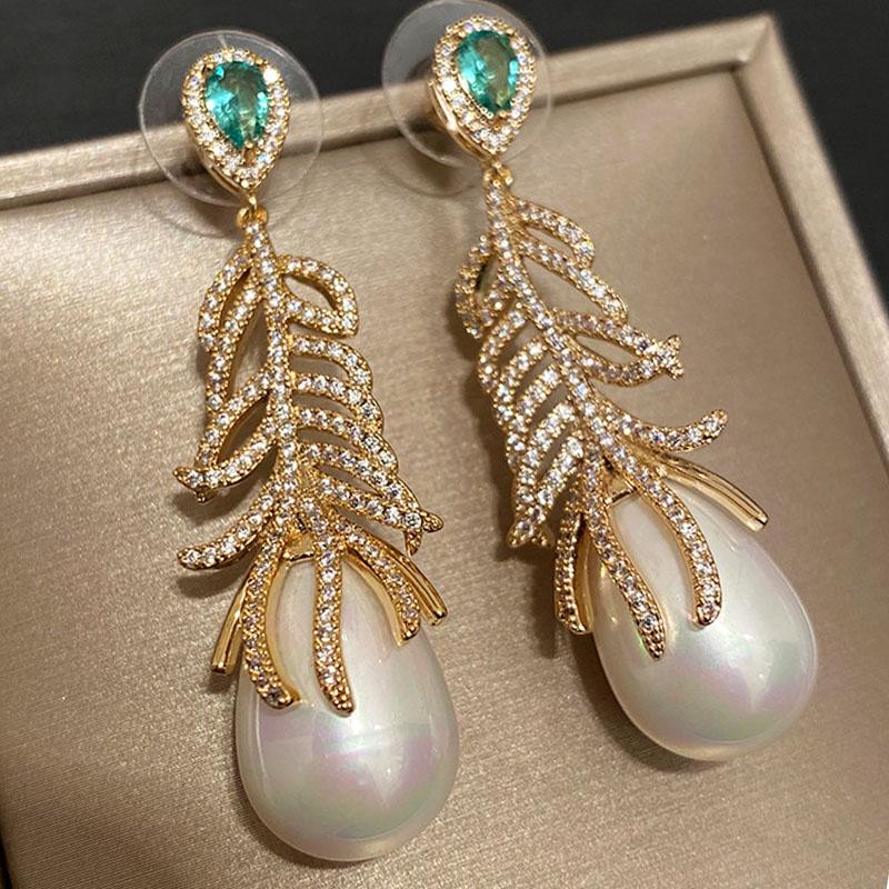 

Hoop & Huggie Vintage Feather Big Pearl Pendant Earrings For Women 2021 Temperament High Quality Stainless Steel Luxury Korean Gifts