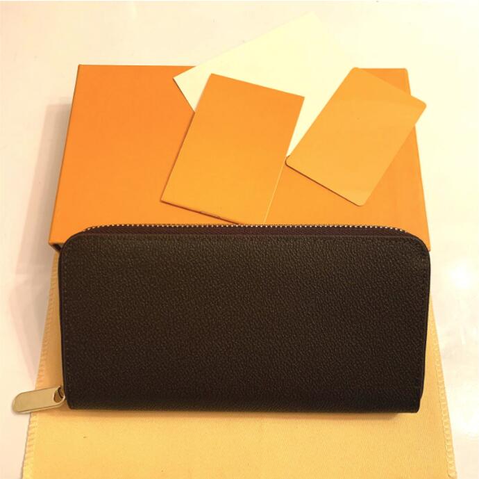 

Zippy Wallet Vertical The Most Stylish Way Carry Around Money,Cards And Coins Famous Design Men Leather Purse Card Holder Long Yellow box, Black-floeal