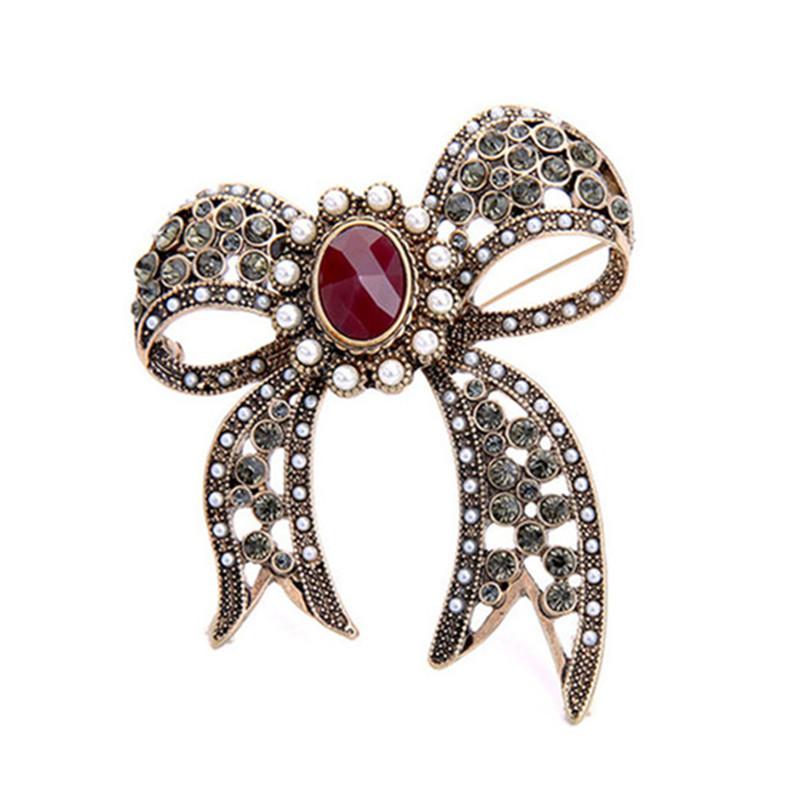 

Pins, Brooches European And American Retro Style Fashion Trend Hollow Imitation Pearl Semi-precious Stone Bow Ladies Brooch