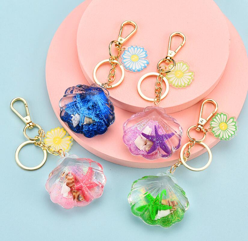

Acrylic Starfishes Pendant Beach Bio-oil Starfish Floating Key Rings Aquarium Ocean World Gift llavero Wholesale