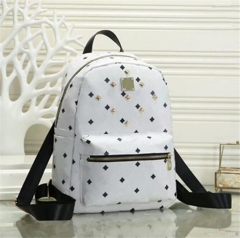 

Leather Handbags High Quality 2 size men and women School Backpack famous Rivet printing Backpack Designer lady Bags Boy and Girl back pack 262