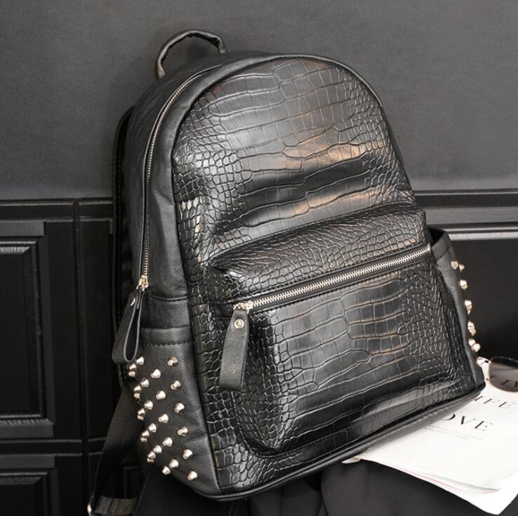 

Factory direct men handbag personality rivet punk backpack crocodile pattern fashion student bag street fashions crocodiles patterns rivets bags, Black