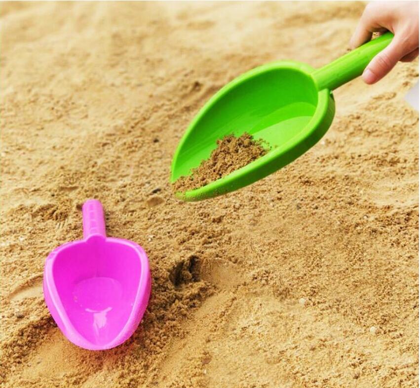 

Children's Beach toys children's shovel baby play in the sand digging sand plastic small shovel children's outdoor toys