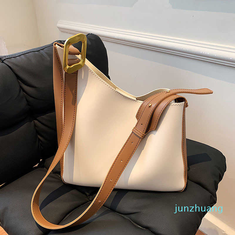 

Designer- Wide Shoulder Trapezoidal Solid Bucket Messenger Simple Leather Bag Soft Atmospheric Shoulder Strap, White