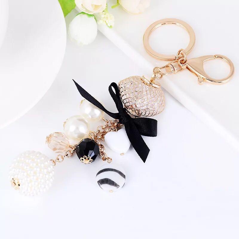 

Keychains Creative Handmade Lantern Zircon Bow Shape Key Chain Girl Bags Decorative Pendant Keychain Charm Beautiful Car Ring
