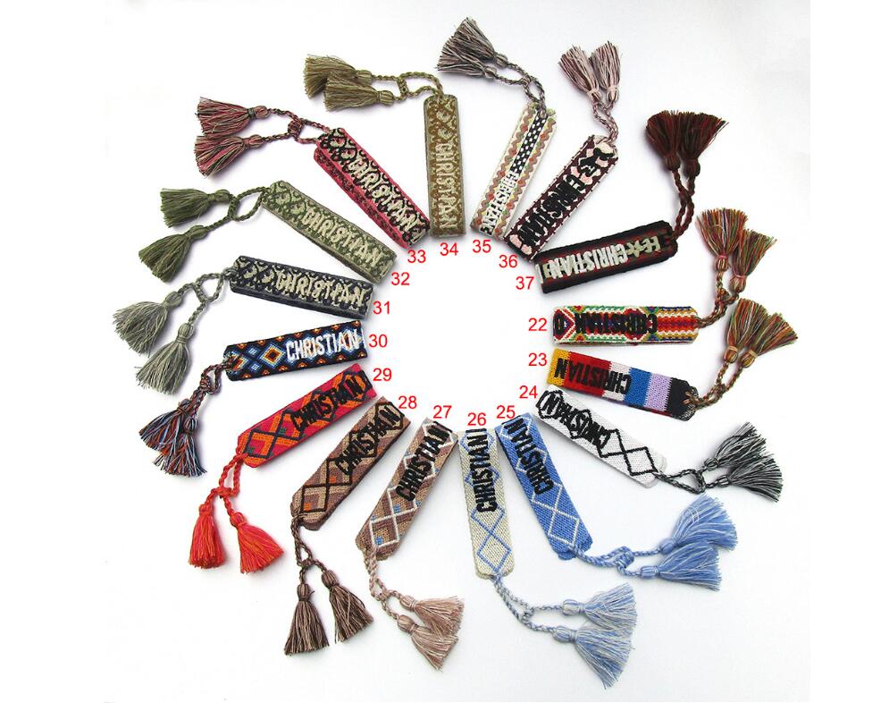 

Luxury style strand rope material woven bracelet with sewing words and tassel hand strap brand jewelry for women gift 7z665k