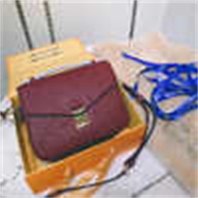 

bags iconic brand bag designer handles luxury cross m40780 handbags embossed embossed shoulder full totes leather body messenger bag clu