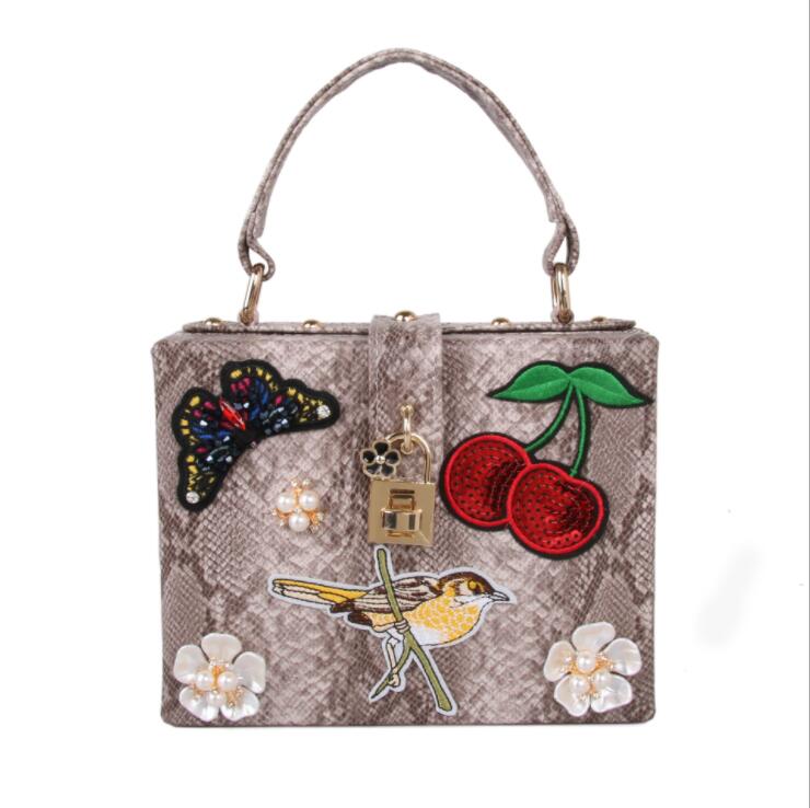 

Factory wholesale women leather shoulder bag elegant atmosphere embroidered handbag street personality Serpentine chain bags sweet Beads Diamonds handbags