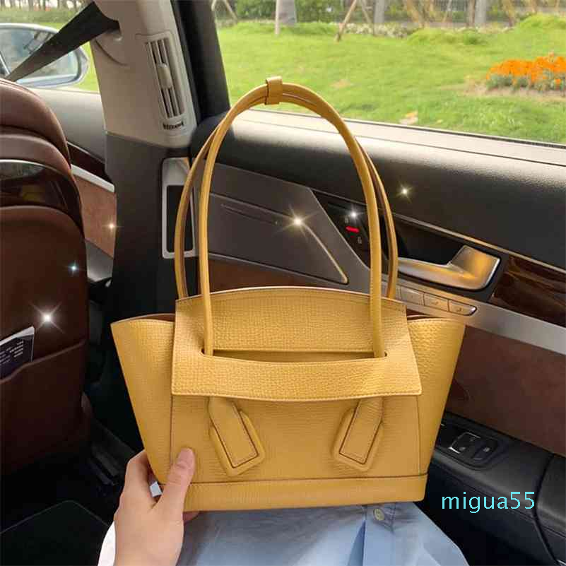

woven wing leather portable one shoulder catfish fashion large capacity tot armpit bag