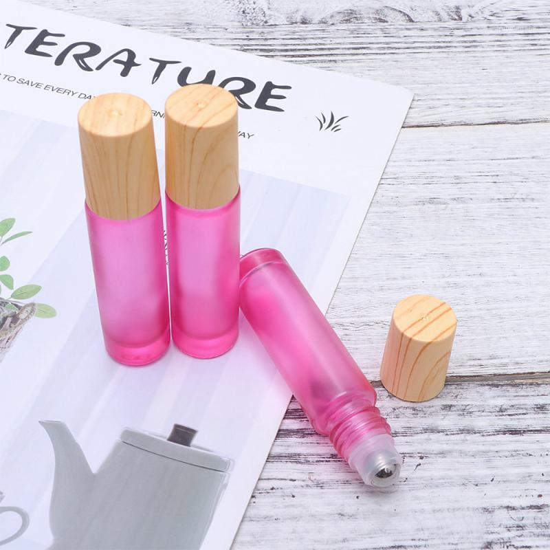 

Storage Bottles & Jars 10pcs 10ML Colorful Empty Refillable Glass Perfume Roll On Bottle With Stainless Steel Roller And Wooden Lid For Esse