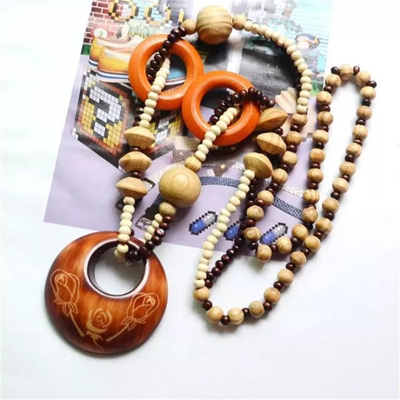 

Pendant Necklaces Magic Sun Lines Hand Carved Exotic Hollow Round Woody Beaded Necklace Fashion Jewelry For Women Birthday Gift Present