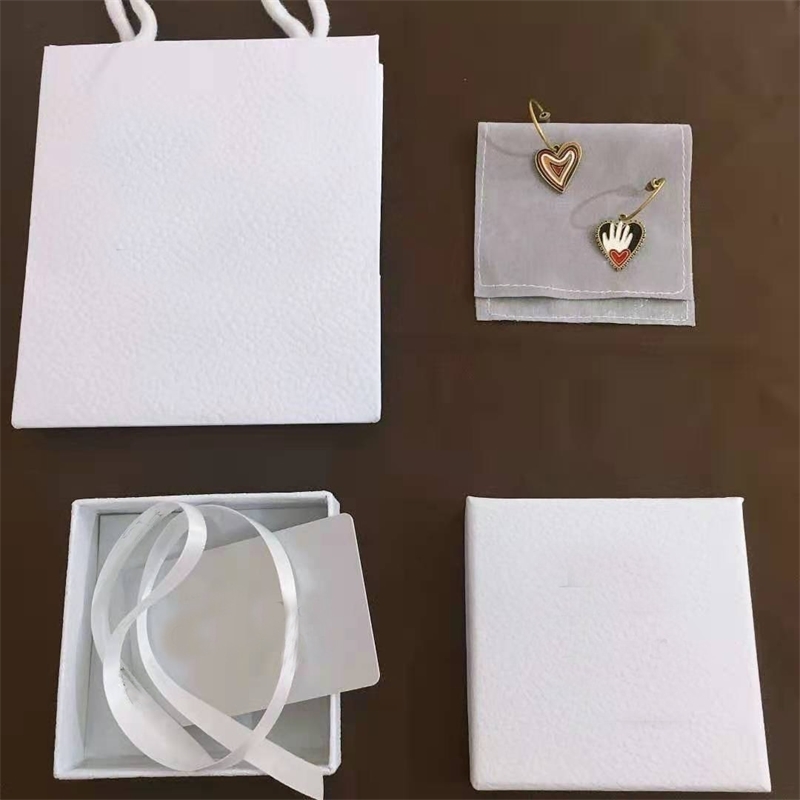 75%OFF Outlet 2021 new heart shaped asymmetric oil drop rubber stud brass material-image-712000800