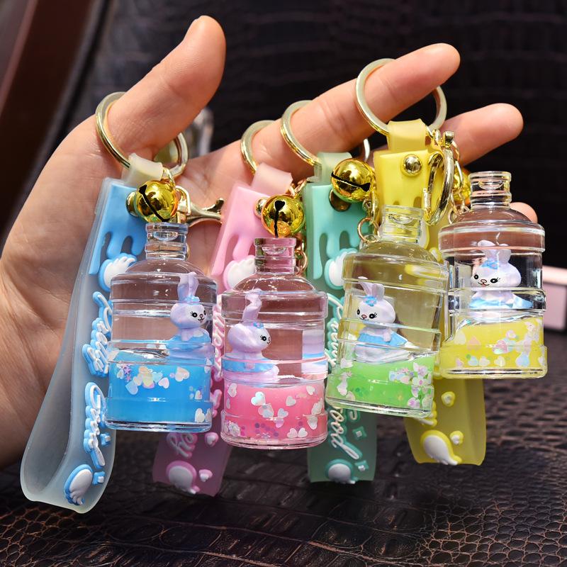 

Keychains Oil Bottle Keychain Creative Floating Girl Key Chain Trend Acrylic Bucket Accessories Women's Bag