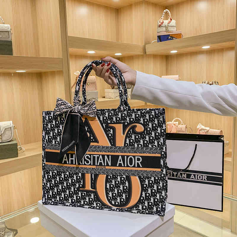 

70% OFF Design bags new fashion foreign style capacity one shoulder handbag summer net red same letter graffiti