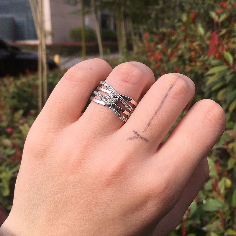 

Mens and womens RING Creative meteor X-shaped geometric interwoven