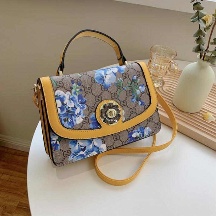 

Factory wholesale women leathers shoulder bags national customs flip printed handbag elegant atmosphere, color matching backpacks fashion leather messenger bag