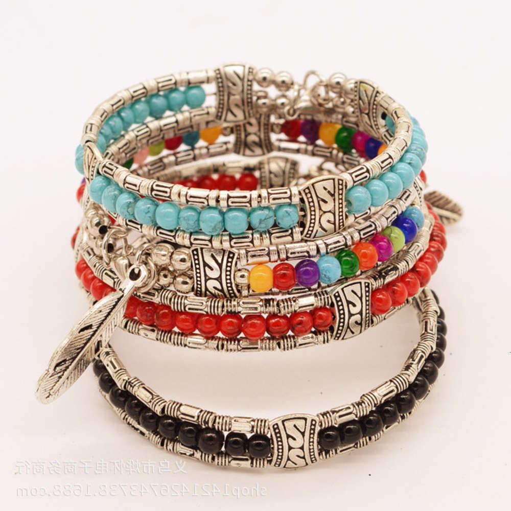 

Hand catenary Exaggerated national style fashion jewelry Tibetan Silver Pine Stone feather Bracelet, Golden;silver