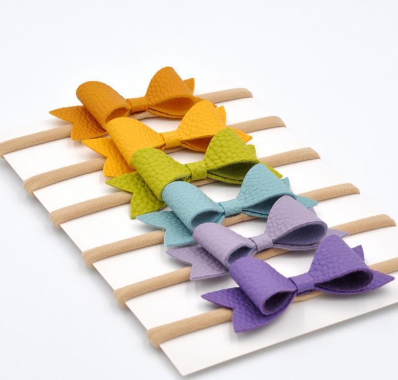 

2021 Nylon Headband Matching 2.5inch Faux Leather Bow Infant Hair Bow Headband Baby Hair Accessory 24pcs/lot, Multi-color