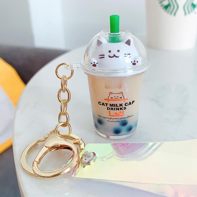 

Keychains Creative Water World Animal Fruit Quicksand Key Chain Pendant