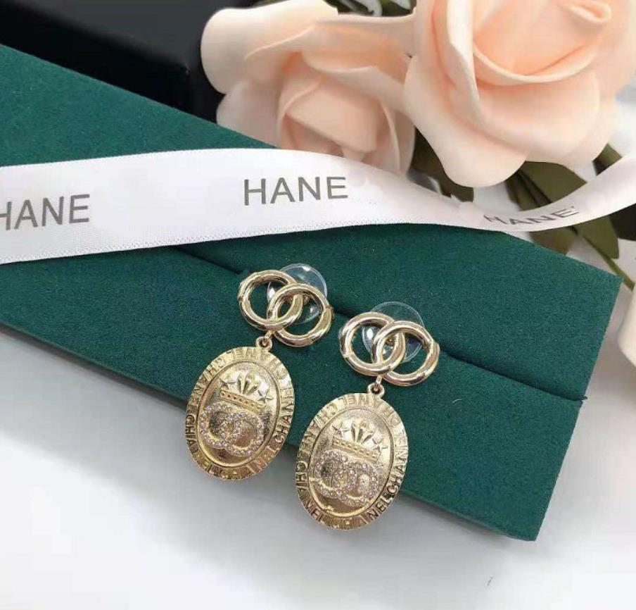 

Xiangjia egg shaped letter Rhinestone Earrings 2021 small Xiangfeng brass retro Earrings 925 silver needle