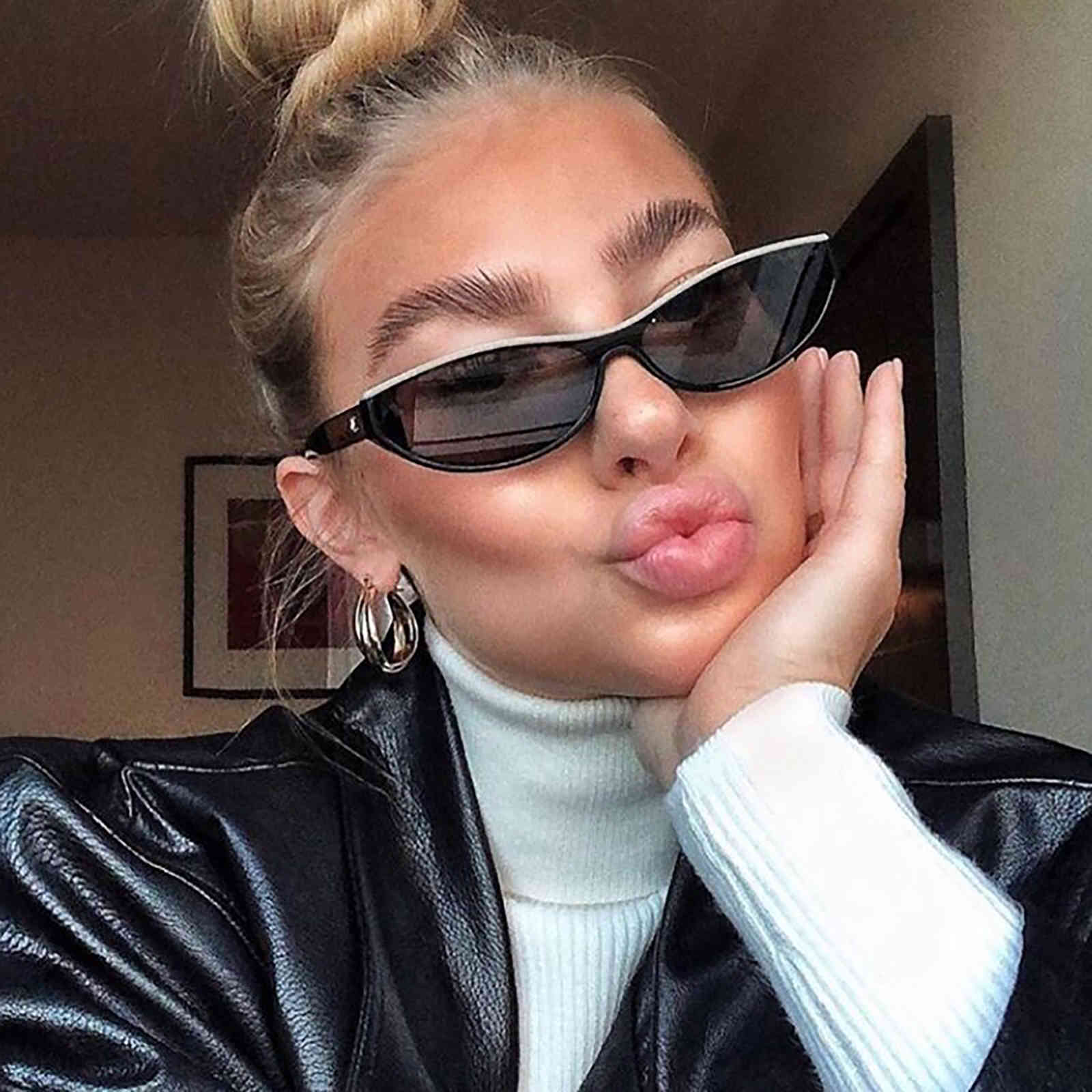 

The 2021 European and American modern retro cat eyes narrow street snap big sunglasses