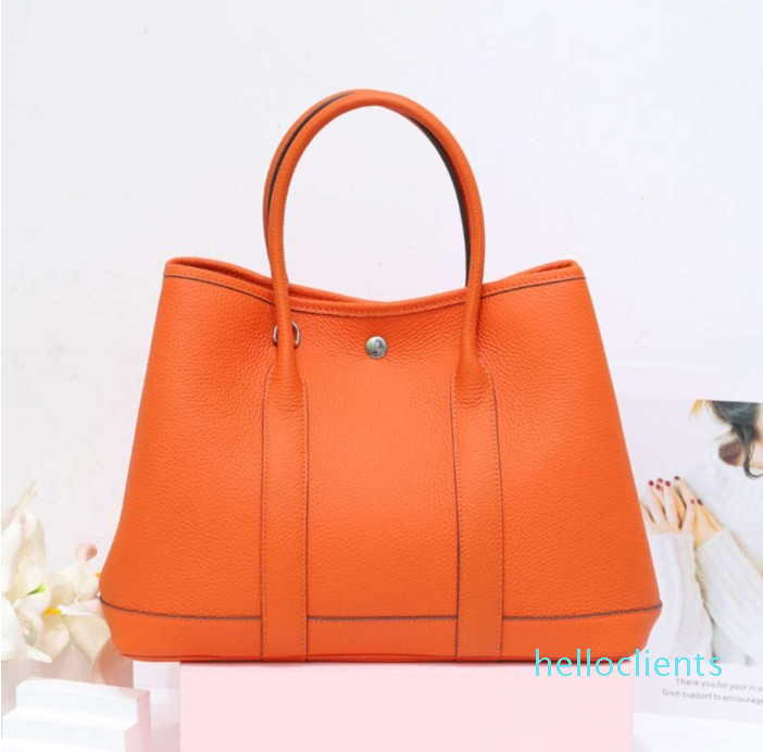 

Large capacity fashionable leather women's bag top layer cowhide garden Tongqin multi-function hand large one shoulder slant span, Beige